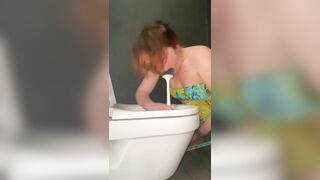 Licking public toilets in the hotel and playing with toilet brush