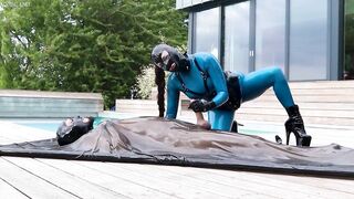 Cristal Kinky in latex catsuit handjob and fucking bound sub in latex vacbed Preview