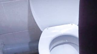 Teen girl went to dormitory toilet to pee and masturbate.