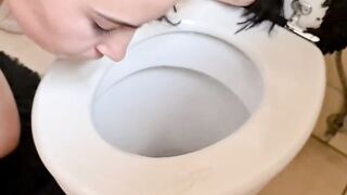 Slut sucking and jerking cock, licking cum off toilet seat