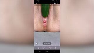 Ftm masturbates hairless noisy pussy with a cucumber close up.
