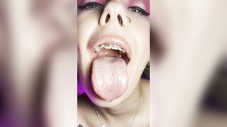 Mouth teasing. Sloppy girl with braces