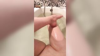 Shy girl in the bathtub showing off clean shaved pussy - modest traditional girl on homemade video
