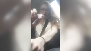 Beautiful junkie doing a shot in the car