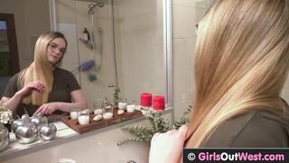 Cute blonde babe masturbates in shower
