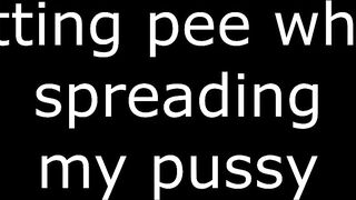 Sitting pee while spreading my pussy