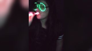 Fucking my mouth and pussy with glow sticks