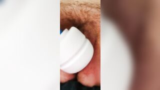 Edging hairy pussy with magic wand moaning