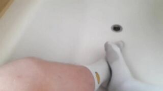 cute twink cums and pees his pants and socks in the bathtub