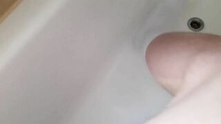 cute twink cums and pees his pants and socks in the bathtub