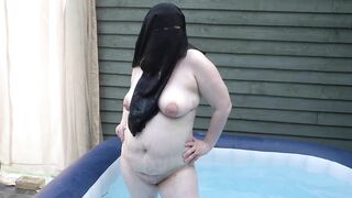 naked in Niqab in the hot tub