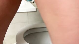 The girl wanted to pee through her panties and wet them in the toilet