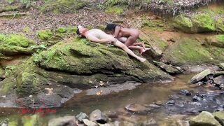 Naked Interracial Couple Fuck Outdoors on Riverbank
