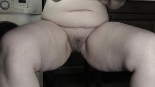 Hairy pussy of a mature bbw housewife milf under the table.