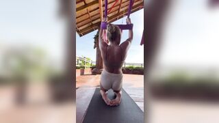 Gym girl works on flexibility - stretchy girl