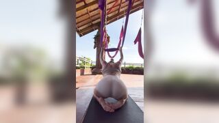Gym girl works on flexibility - stretchy girl