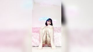 Cute fit squatting Asian girl pleasures her big clit while dripping pussy juices