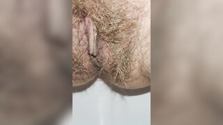 Have you seen what a hairy pissing pussy looks like close up?