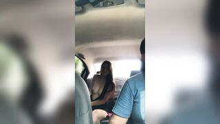 beautiful student changes clothes in the back seat of the uber