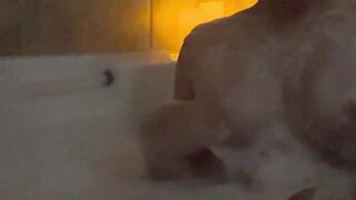 Playing with my perky boobs in the bath